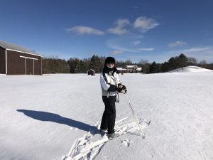 a senior on skis in the snow
