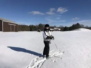 a senior on skis in the snow